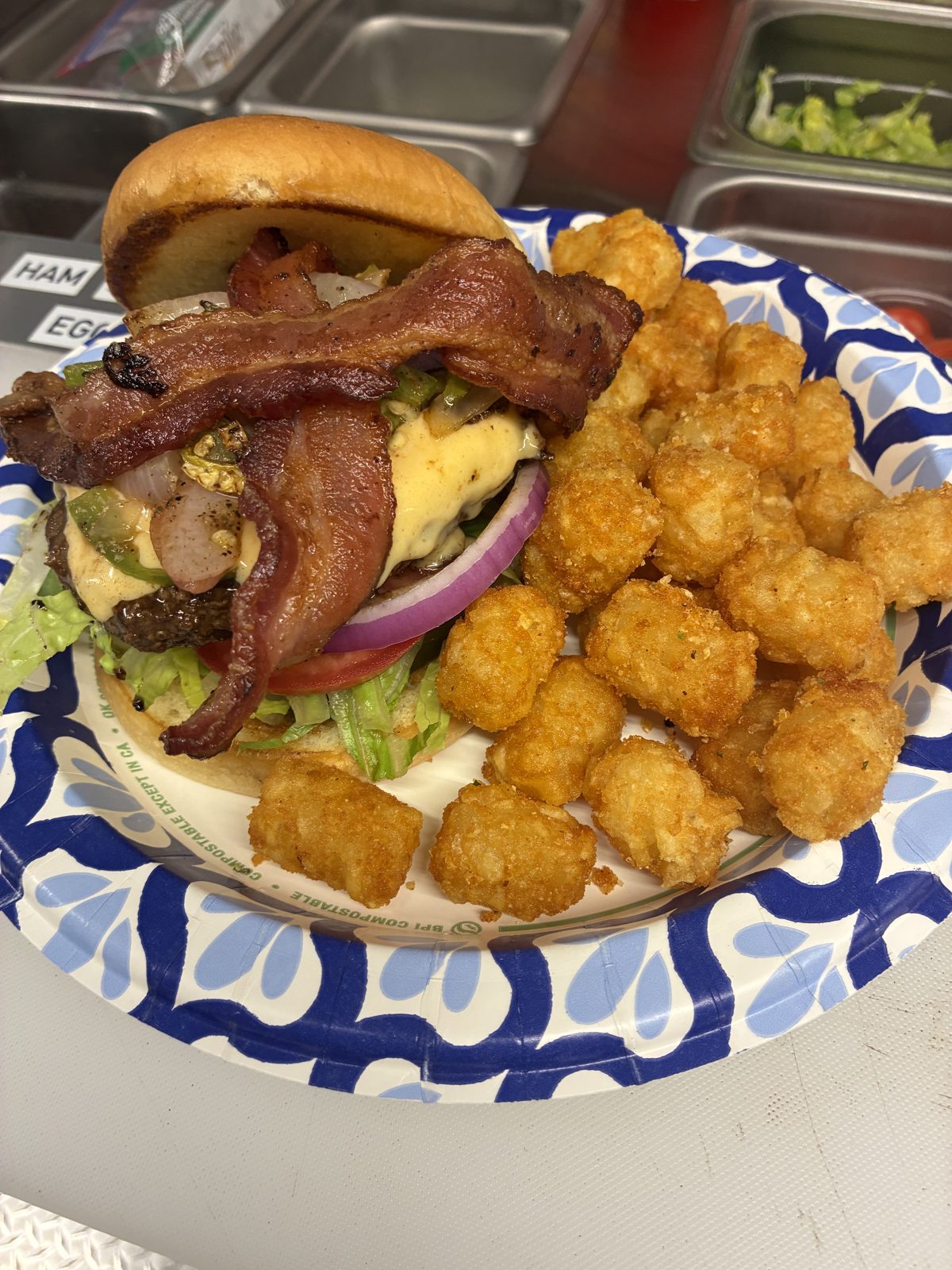 Double bacon burger with tater tots
