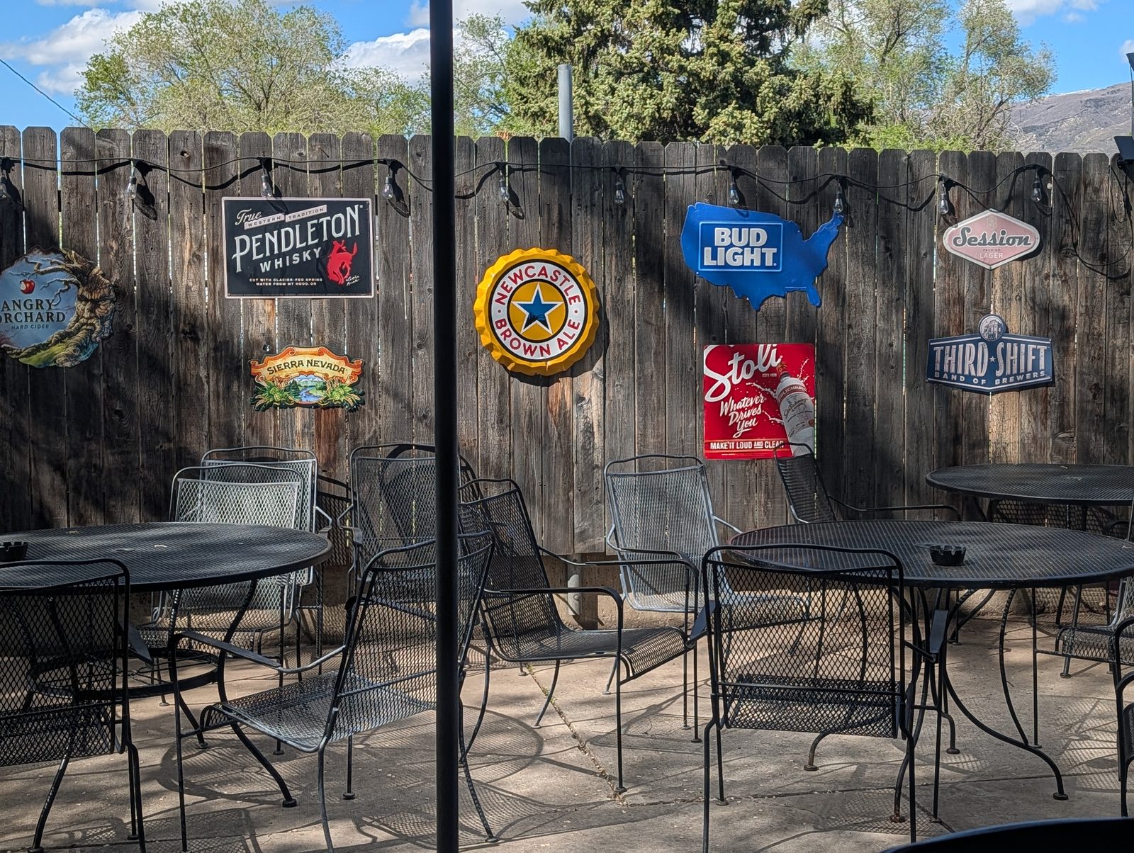 Down Under outdoor patio with beer signs