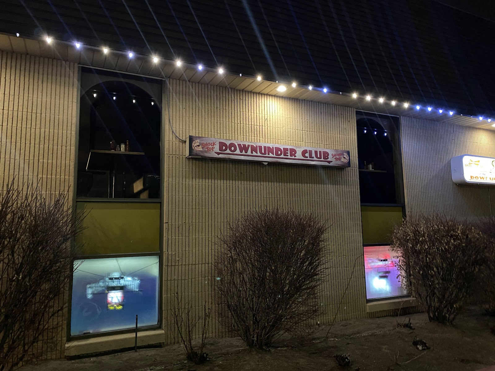 Down Under Club exterior sign at night