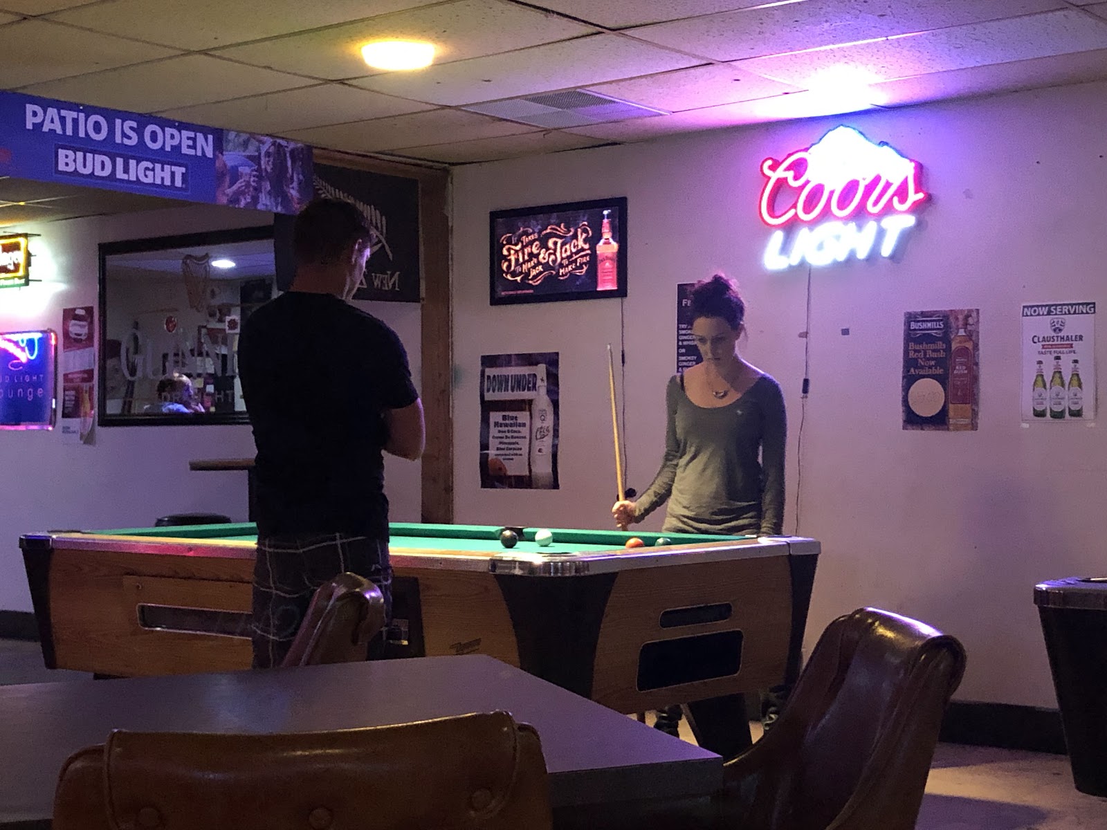 Friends playing pool
